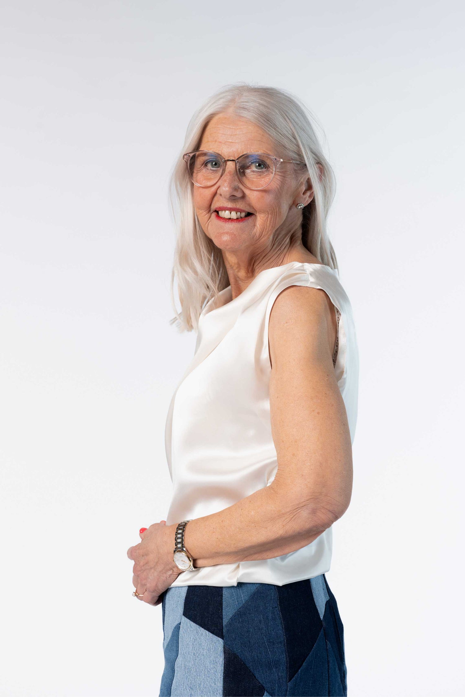 The White Sleeveless Silk Shirt