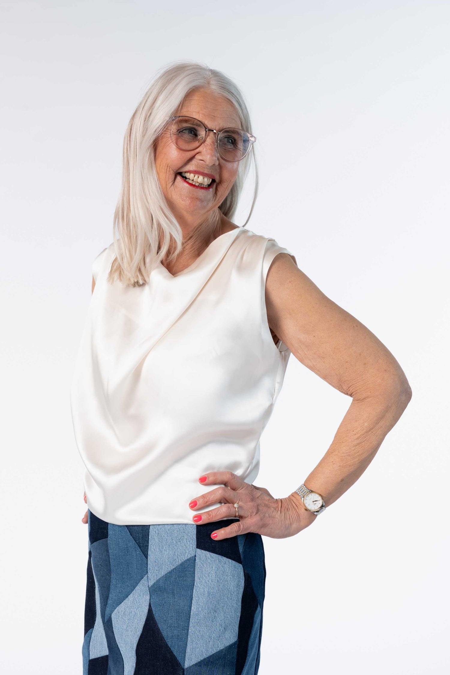 The White Sleeveless Silk Shirt